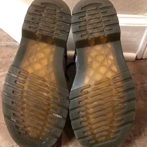 Girl’s Dr. Martens.